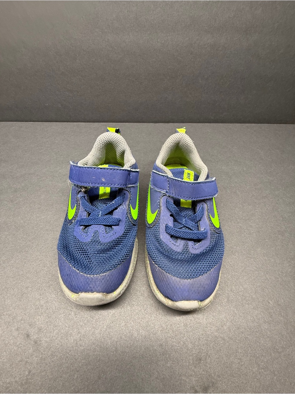 Nike Kids Navy Sneakers with Neon Green Swoosh